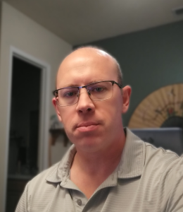 Headshot of Ryan Phillippi, founder of Nomad Den